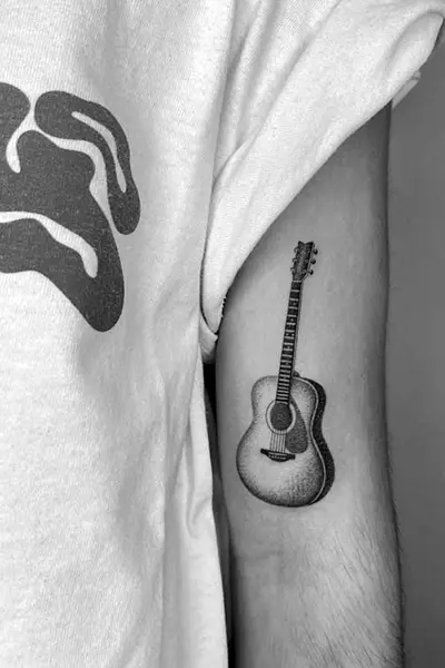 100 Amazing Tattoo Designs for Men You Must Try! 19 Acoustic Guitar Tattoo for Music Lovers
