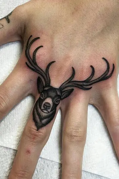 100 Amazing Tattoo Designs for Men You Must Try! 39 Deer Hand Tattoo With Grace