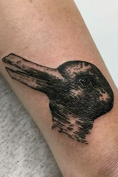 100 Amazing Tattoo Designs for Men You Must Try! 83 Duck Rabbit Illusion Tattoo on Hand