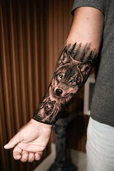 100 Amazing Tattoo Designs for Men You Must Try! 26 Feral Wolf Tattoo With Ice Bite