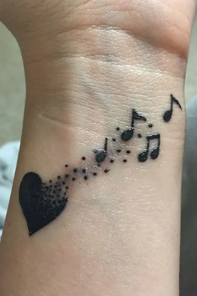 100 Amazing Tattoo Designs for Men You Must Try! 33 Heart to Music Tattoo With Emotion