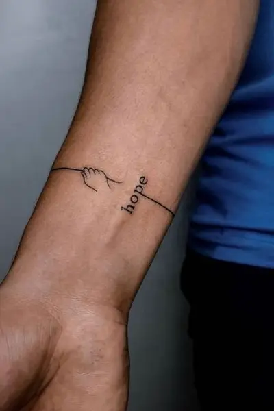 100 Amazing Tattoo Designs for Men You Must Try! 93 Hope Word Tattoo on Wrist for Men