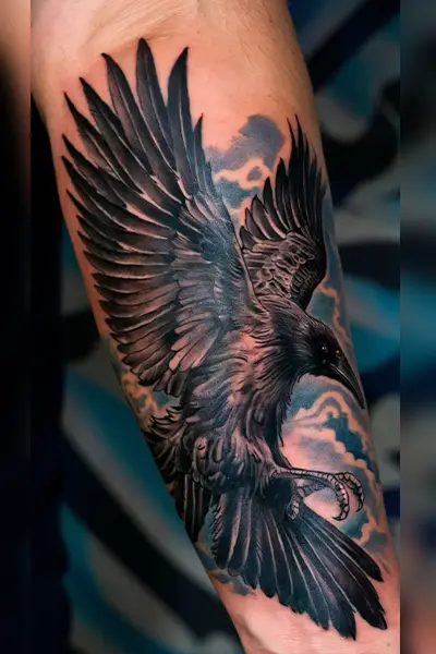 100 Amazing Tattoo Designs for Men You Must Try! 22 Raven Tattoo With Fierce Energy