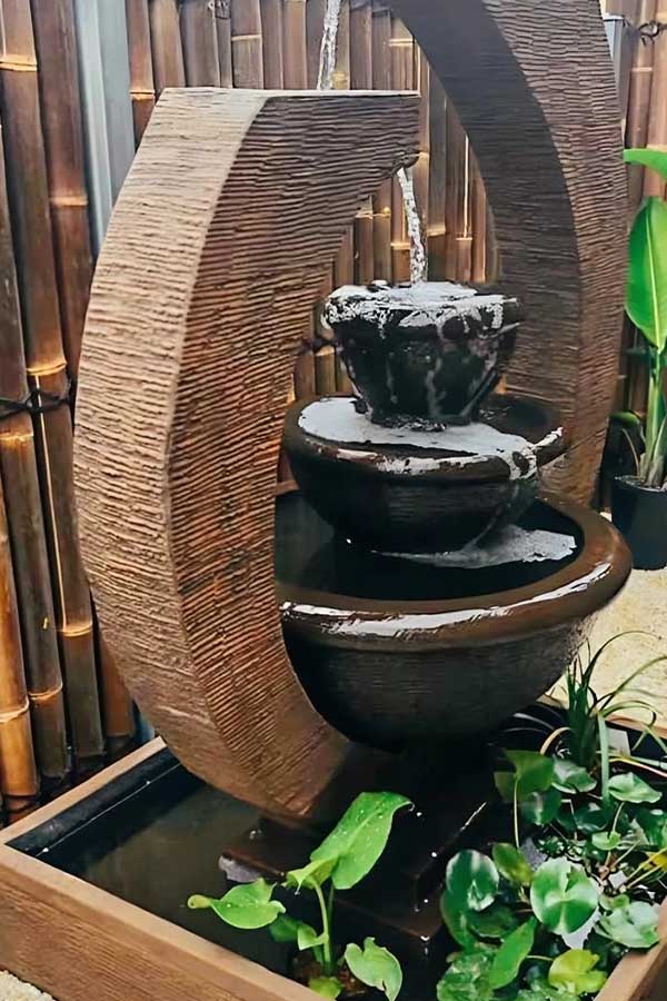29+ Cozy Backyard Ideas for Small Outdoor Spaces 12 Add a Compact Water Feature