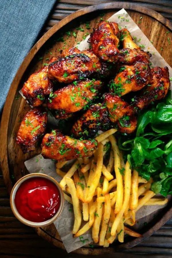 21 4th of July Foods to Enjoy the Taste of Freedom on Independence Day 1 BBQ Chicken Wings with a Honey Sriracha Glaze