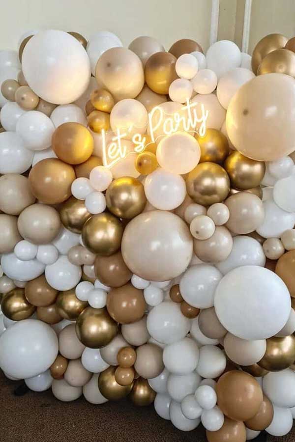 23 Picture-Perfect Graduation Party Backdrop Ideas That Will Wow Your Guests 19 Balloon Wall With Let’s Party Sign