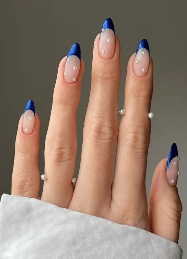 48 Super Trendy French Tip Nails and Manicure Designs You Will Instantly Love 36 Breezy Blue Marble Accent Tip Nail Designs