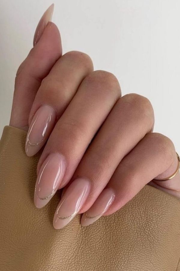 47 Cute Graduation Nail Ideas Mani Designs To Instantly Elevate Your Graduation Look 12 Chic Minimal Nails with Glittery Touch