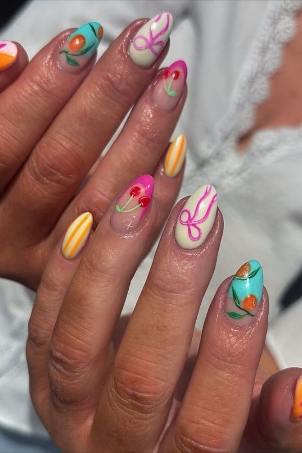 29 Juicy Fruit Nail Designs to Sweeten Your Summer Look 2 Fruits and Bow Combo Nails Idea