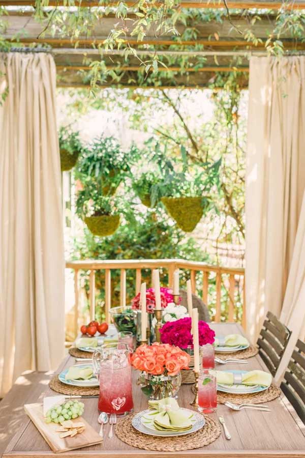 44 Back Patio Ideas on a Budget to Transform Small Outdoor Spaces 21 Hang Outdoor Curtains for Soft Privacy