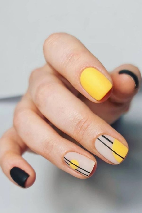34 Soft to Bold Cutest Yellow Nail Designs Ideas Perfect for Summer and Beyond 11 Matte Yellow Black Nails