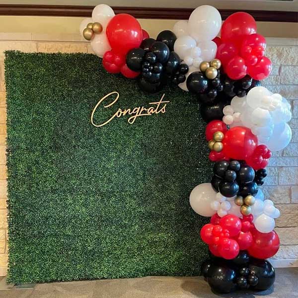 23 Picture-Perfect Graduation Party Backdrop Ideas That Will Wow Your Guests 8 Nature-Inspired Green Leaves Backdrop