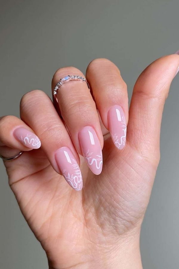47 Cute Graduation Nail Ideas Mani Designs To Instantly Elevate Your Graduation Look 19 Pink Natural Swirls Nails