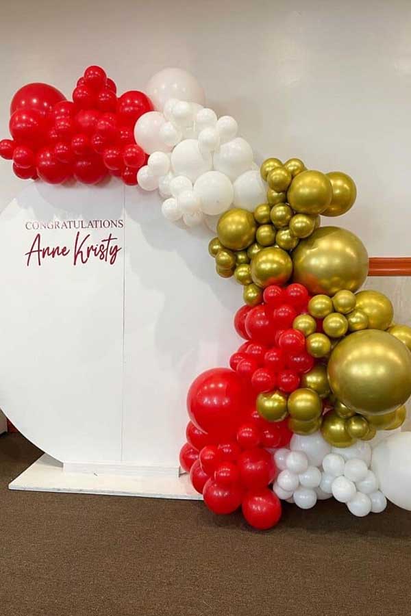 23 Picture-Perfect Graduation Party Backdrop Ideas That Will Wow Your Guests 13 Round Wooden Backdrop