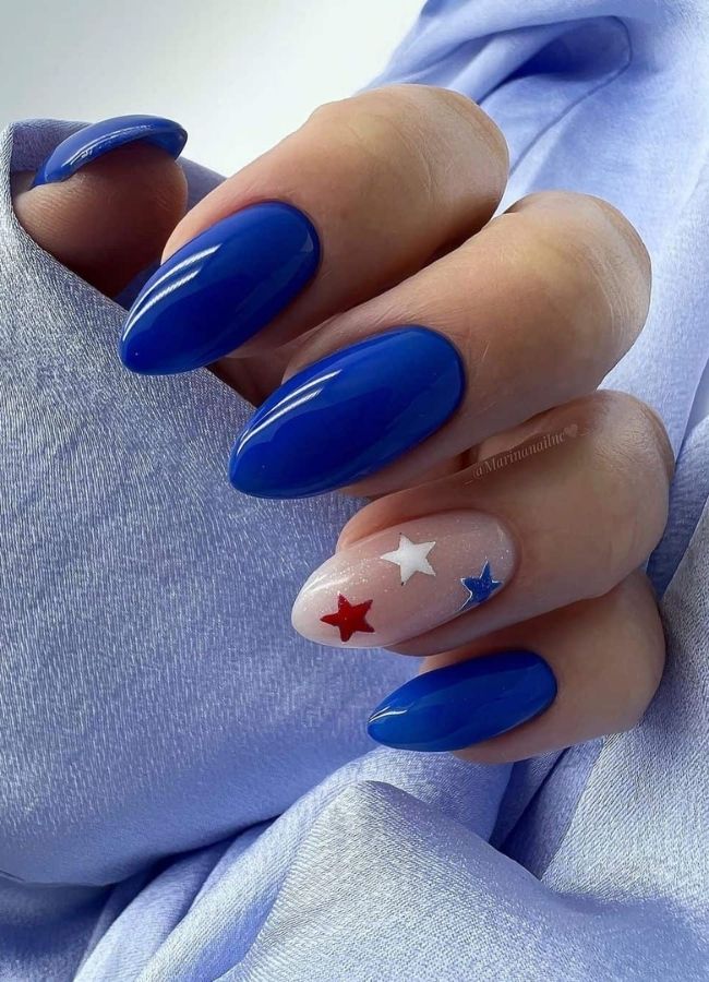 59 Elegant 4th Of July Nails Patriotic Nail Designs You Must Try on Independence Day 13 Royal Blue Fourth of July Mani with Dainty Stars