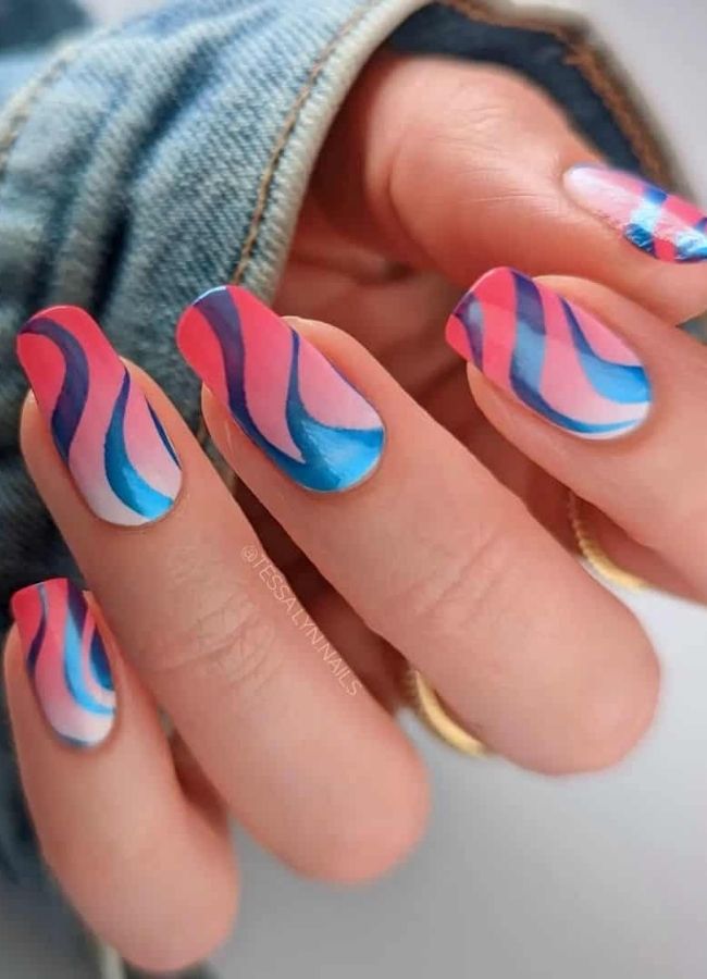59 Elegant 4th Of July Nails Patriotic Nail Designs You Must Try on Independence Day 26 Shimmering Blue Metallic Swirl Nails