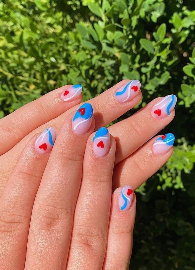 59 Elegant 4th Of July Nails Patriotic Nail Designs You Must Try on Independence Day 1 Side French Tips with a Festive Twist