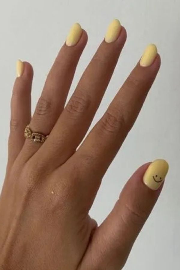34 Soft to Bold Cutest Yellow Nail Designs Ideas Perfect for Summer and Beyond 29 Smiley Solid Nails Art