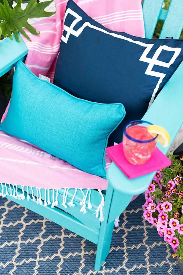 44 Back Patio Ideas on a Budget to Transform Small Outdoor Spaces 9 Try Turkish Towels as Throws