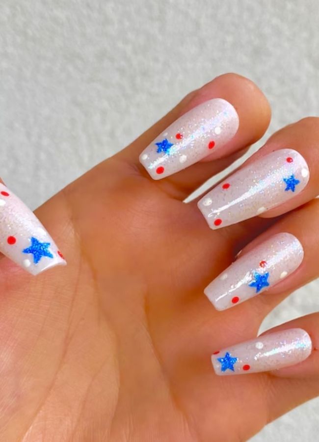 59 Elegant 4th Of July Nails Patriotic Nail Designs You Must Try on Independence Day 17 Twinkle of Stars with Blue Glitter Nails