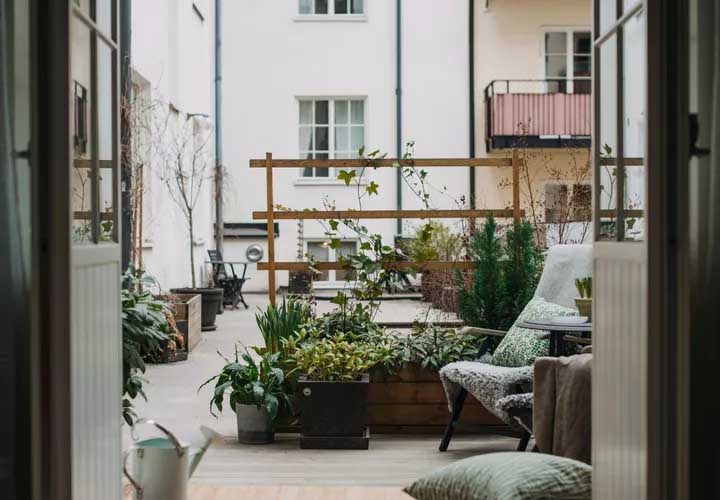44 Back Patio Ideas on a Budget to Transform Small Outdoor Spaces 40 Use Planters for Privacy
