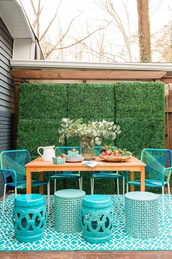 44 Back Patio Ideas on a Budget to Transform Small Outdoor Spaces 26 Use a Faux Hedge Wall