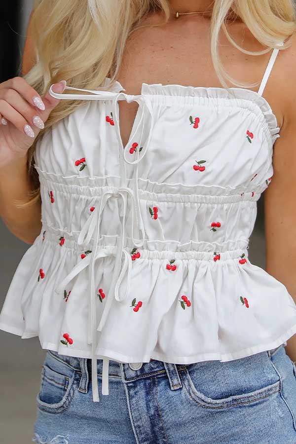 37 Festive 4th of July Outfits to Celebrate Independence Day in Style 10 White Ruffle Cherry Tank