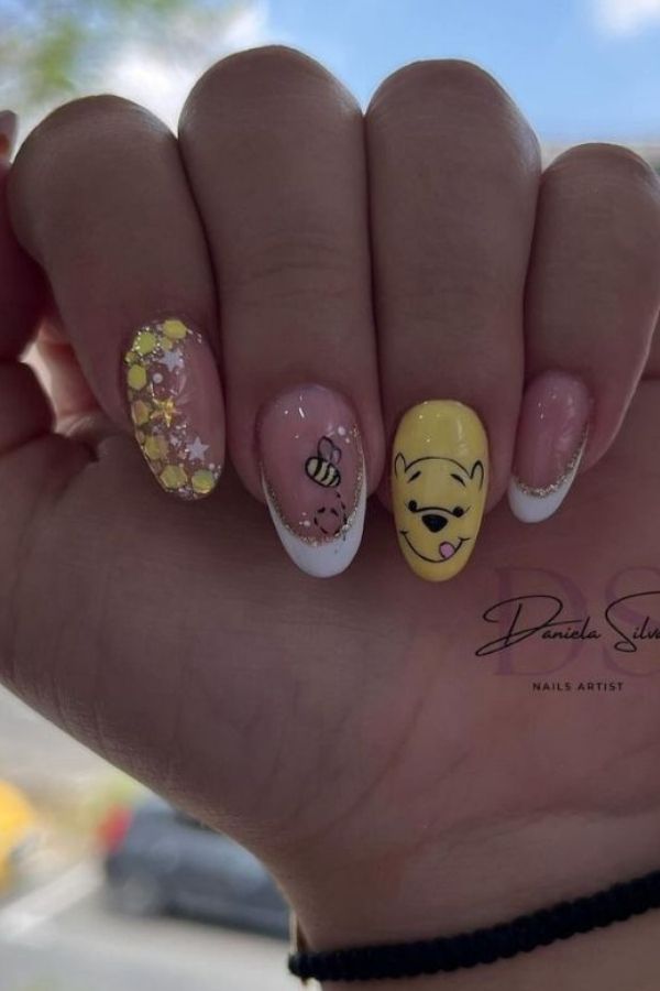 34 Soft to Bold Cutest Yellow Nail Designs Ideas Perfect for Summer and Beyond 33 Winnie the Pooh Nails