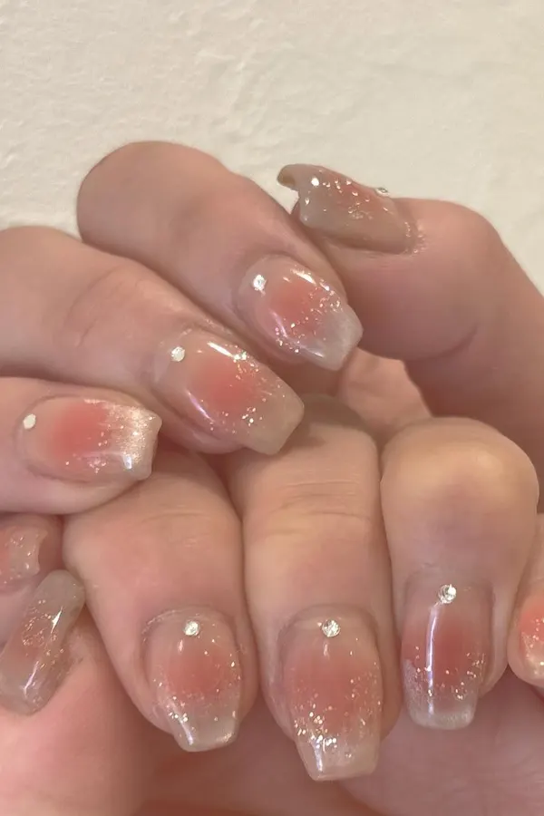 44 Simple Clear Nail Designs For Fresh, Clean, and Modern Mani Look 12 Blushing Gemstone and Glitter Nails