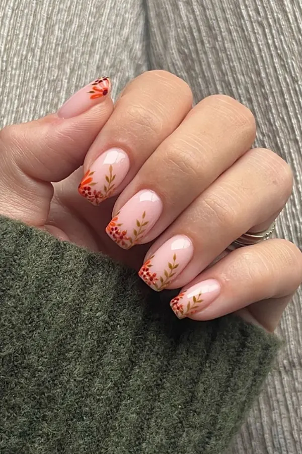 37. Glam Fall Wedding Nail Ideas For Guests & Bride That Look Great in Every Photo 30 Burnt Orange and Burgundy Floral Tip Nails