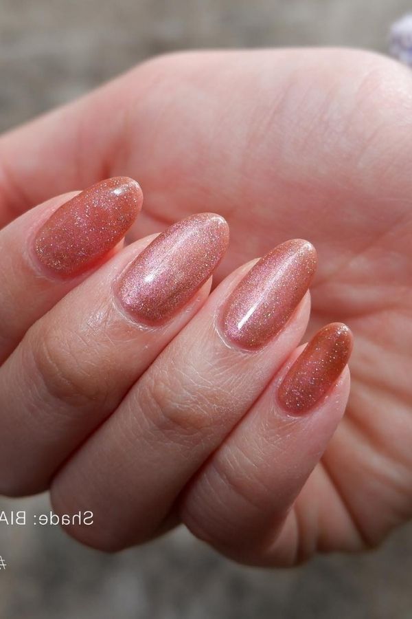 39 Gorgeous Coral Nail Designs Ideas for Short and Long Nails 5 Cateye Coral Nails