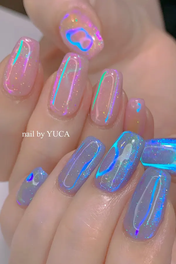 44 Simple Clear Nail Designs For Fresh, Clean, and Modern Mani Look 4 Celestial Sparkle Nails with a Clear Finish