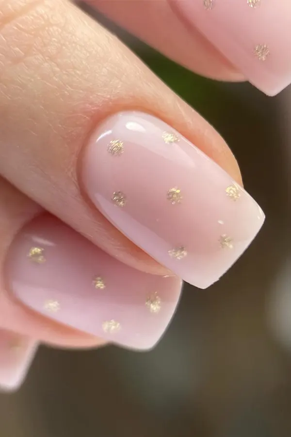 44 Simple Clear Nail Designs For Fresh, Clean, and Modern Mani Look 3 Gold Dot Nails with Pale Pink Tint