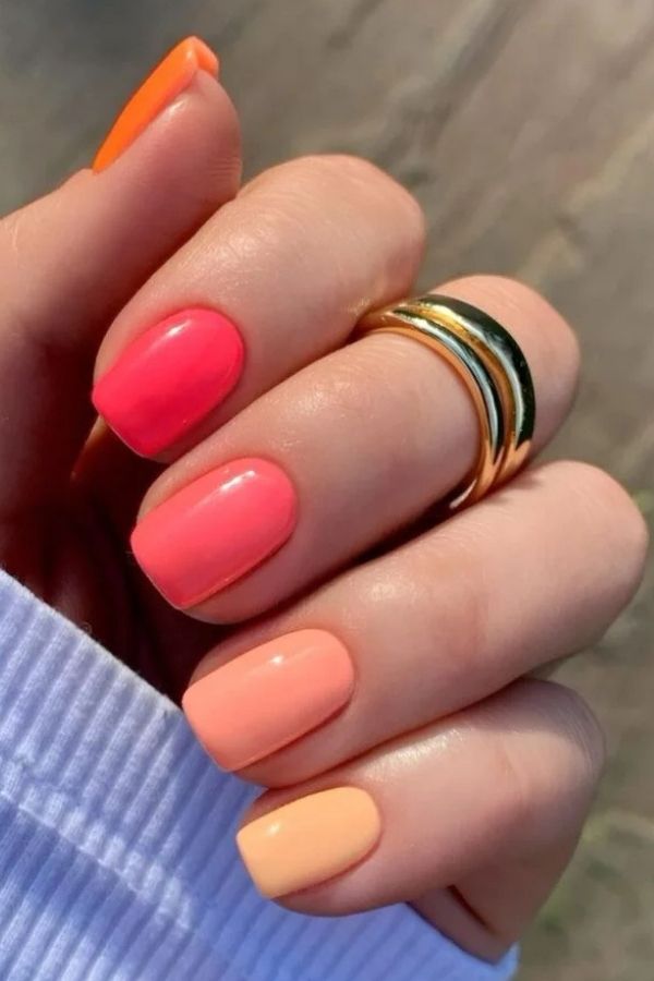 39 Gorgeous Coral Nail Designs Ideas for Short and Long Nails 14 Gradient Skittle Coral Nails