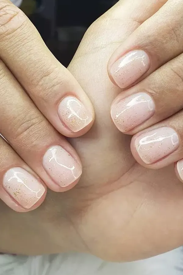 44 Simple Clear Nail Designs For Fresh, Clean, and Modern Mani Look 17 Milky Glitter Coated Nails