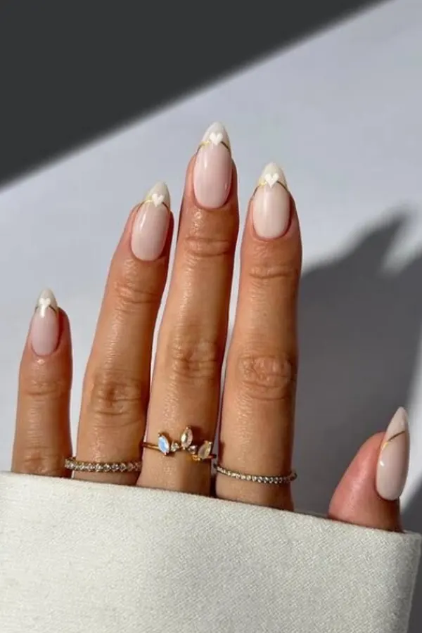 37. Glam Fall Wedding Nail Ideas For Guests & Bride That Look Great in Every Photo 33 Minimal Gold Chrome and Tiny Heart Nails