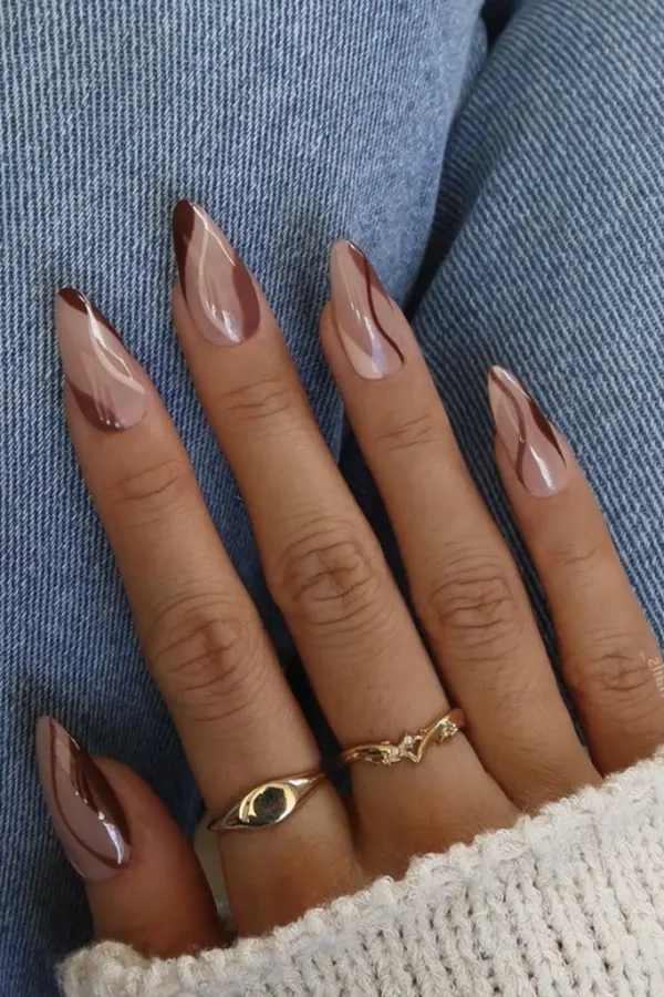 37. Glam Fall Wedding Nail Ideas For Guests & Bride That Look Great in Every Photo 19 Minimalist Nude Mani with Subtle Swirls