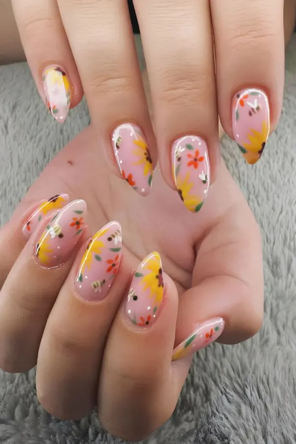 41 Bright and Cheerful Sunflower Nail Designs Ideas You’ll Love to Copy 39 Mixed Blooms on Pink Base