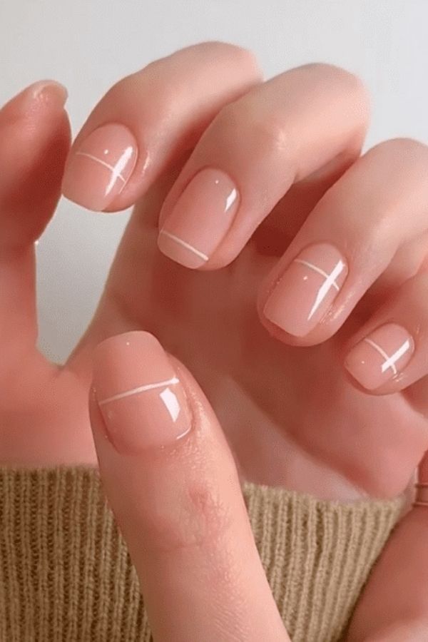 36 Subtle Yet Cute Minimal Nail Designs Mani Ideas You’ll Love to Wear 6 Modern White Stripe Nails