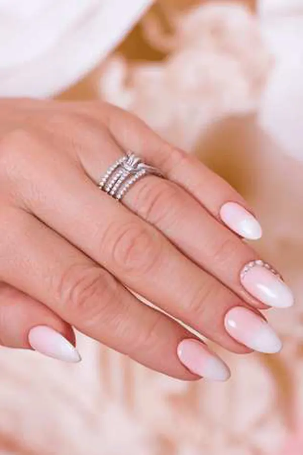 37. Glam Fall Wedding Nail Ideas For Guests & Bride That Look Great in Every Photo 31 Rhinestones Pink and White Ombre Wedding Mani Art