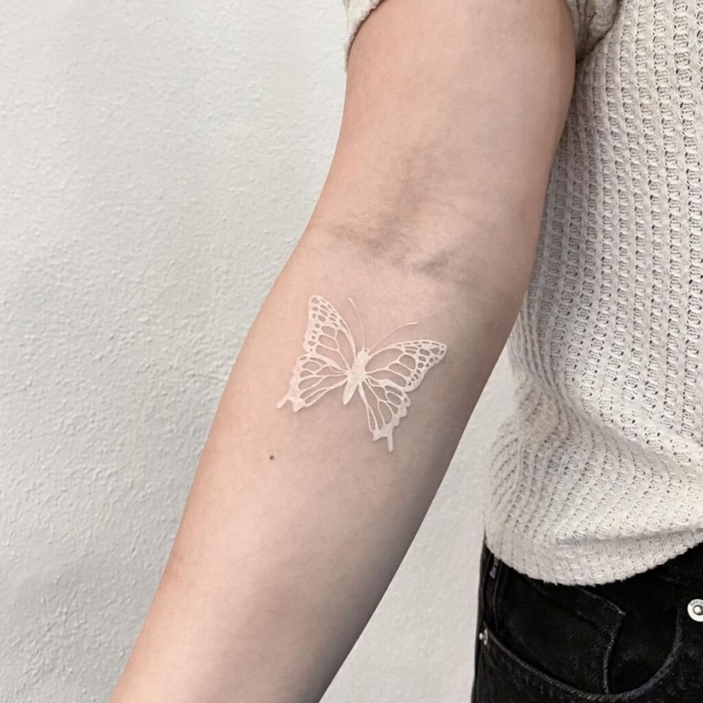 Butterfly White Ink Tattoo