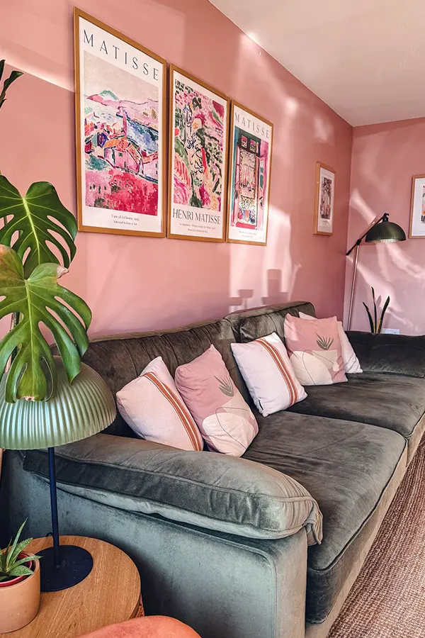 Artistic Pink Living Room With Green Sofa
