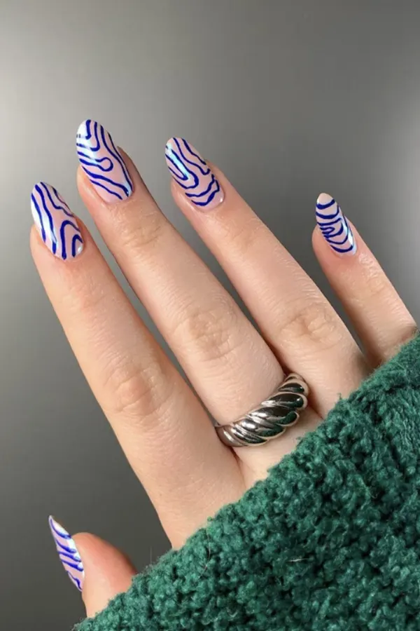 Blue Swirls on Glazed Nails