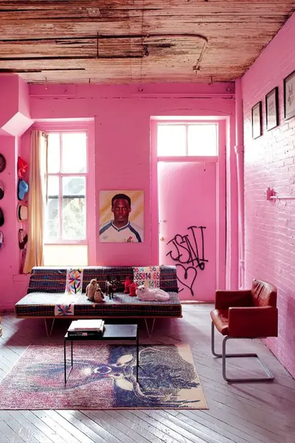 Eclectic Pink Living Room With Brick Walls