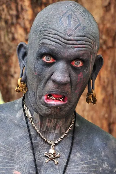 Man Covered Head to Toe in Ink