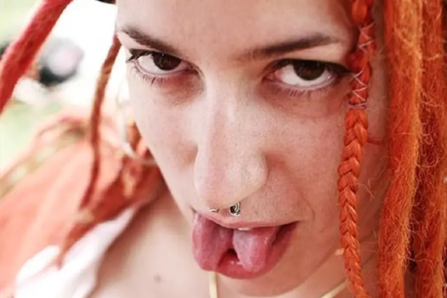 Woman Splits Tongue for Art