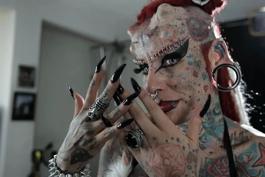 Woman Turns Herself Into Vampire