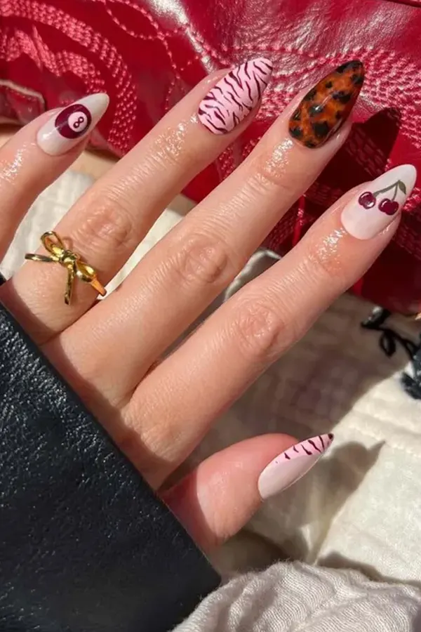 Cherry Nails Meet Leopard Print for a Bold and Playful Summer Look